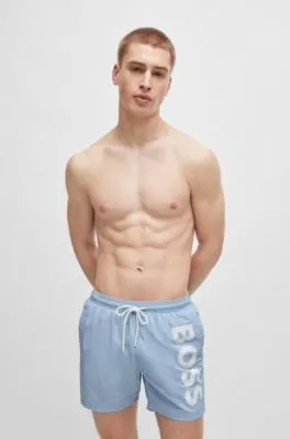 Bañador tipo shorts con forro integral y logo estampado