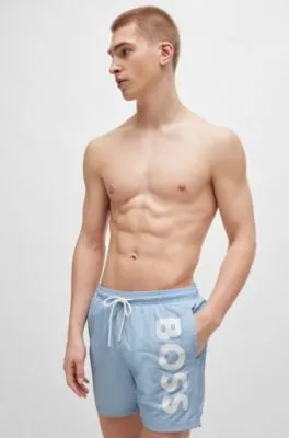 Bañador tipo shorts con forro integral y logo estampado