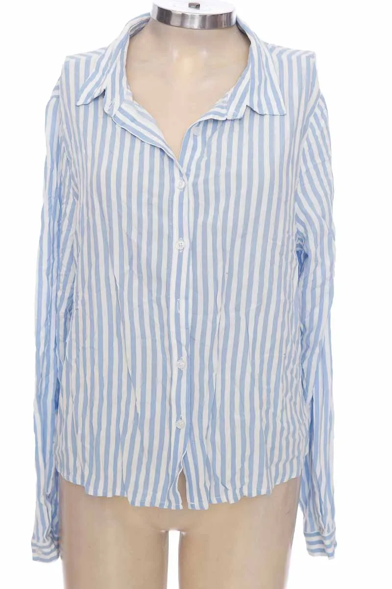 BLUSA COLOR AZUL  SYBILLA