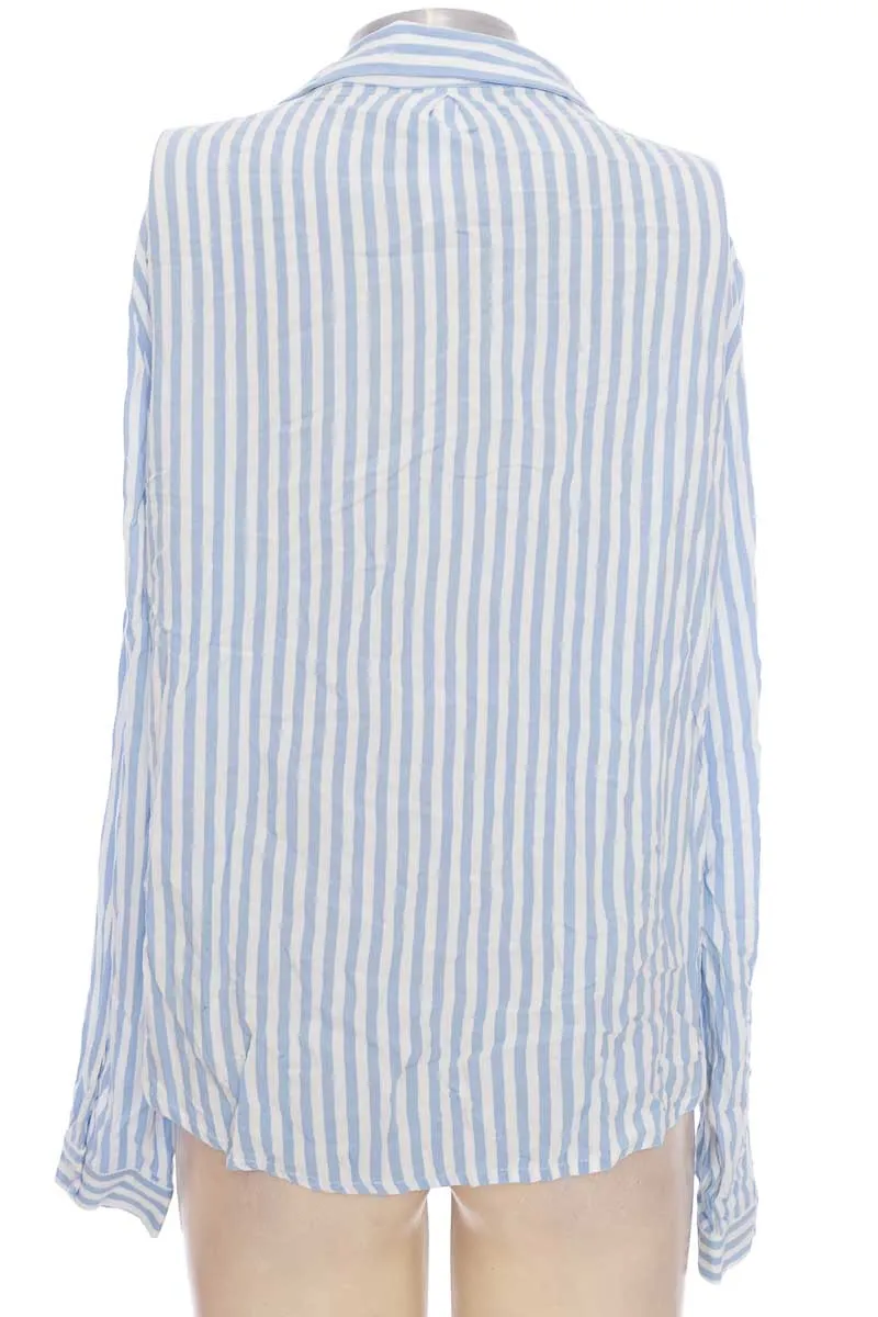 BLUSA COLOR AZUL  SYBILLA