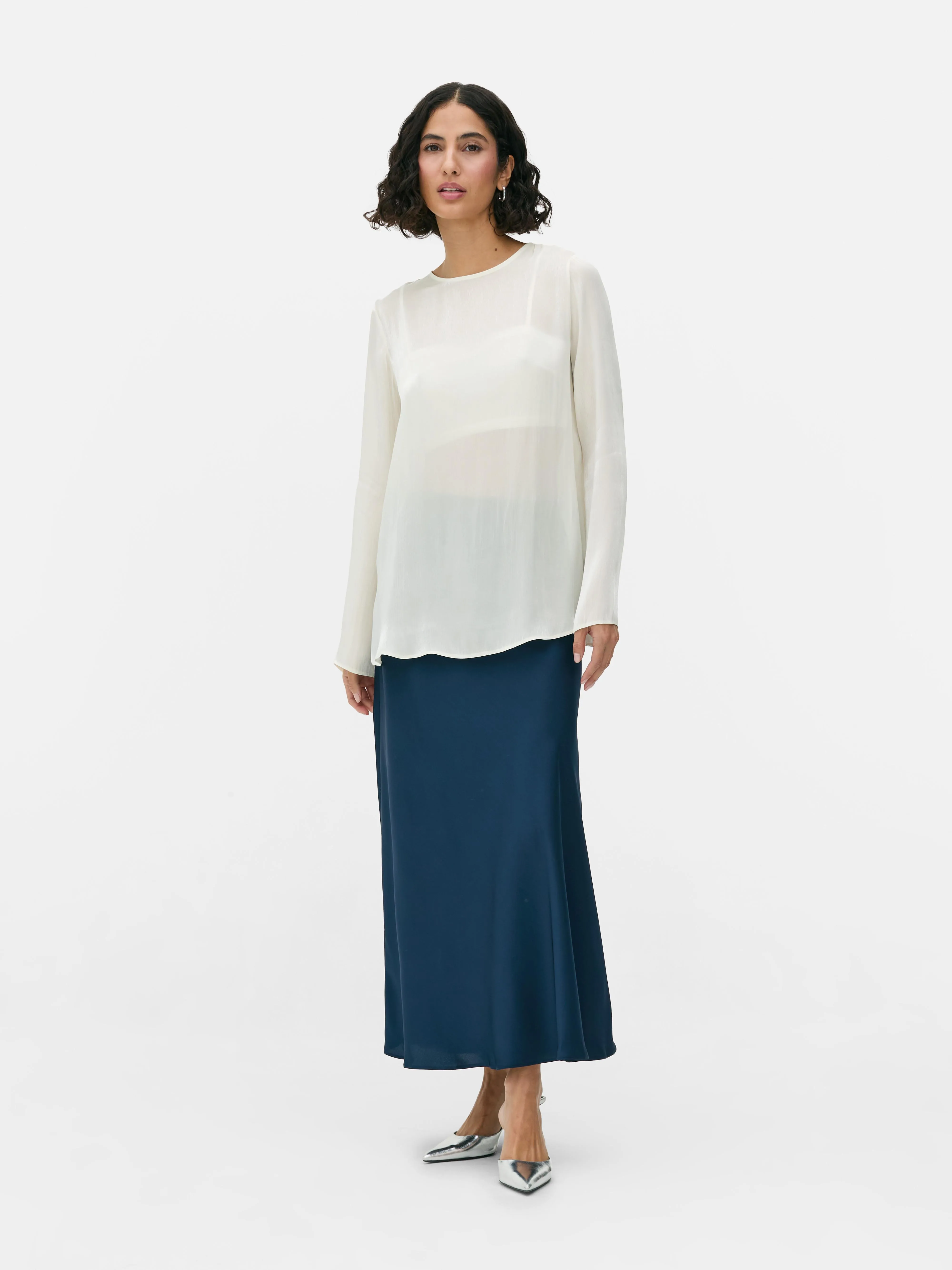 Blusa de manga larga brillante