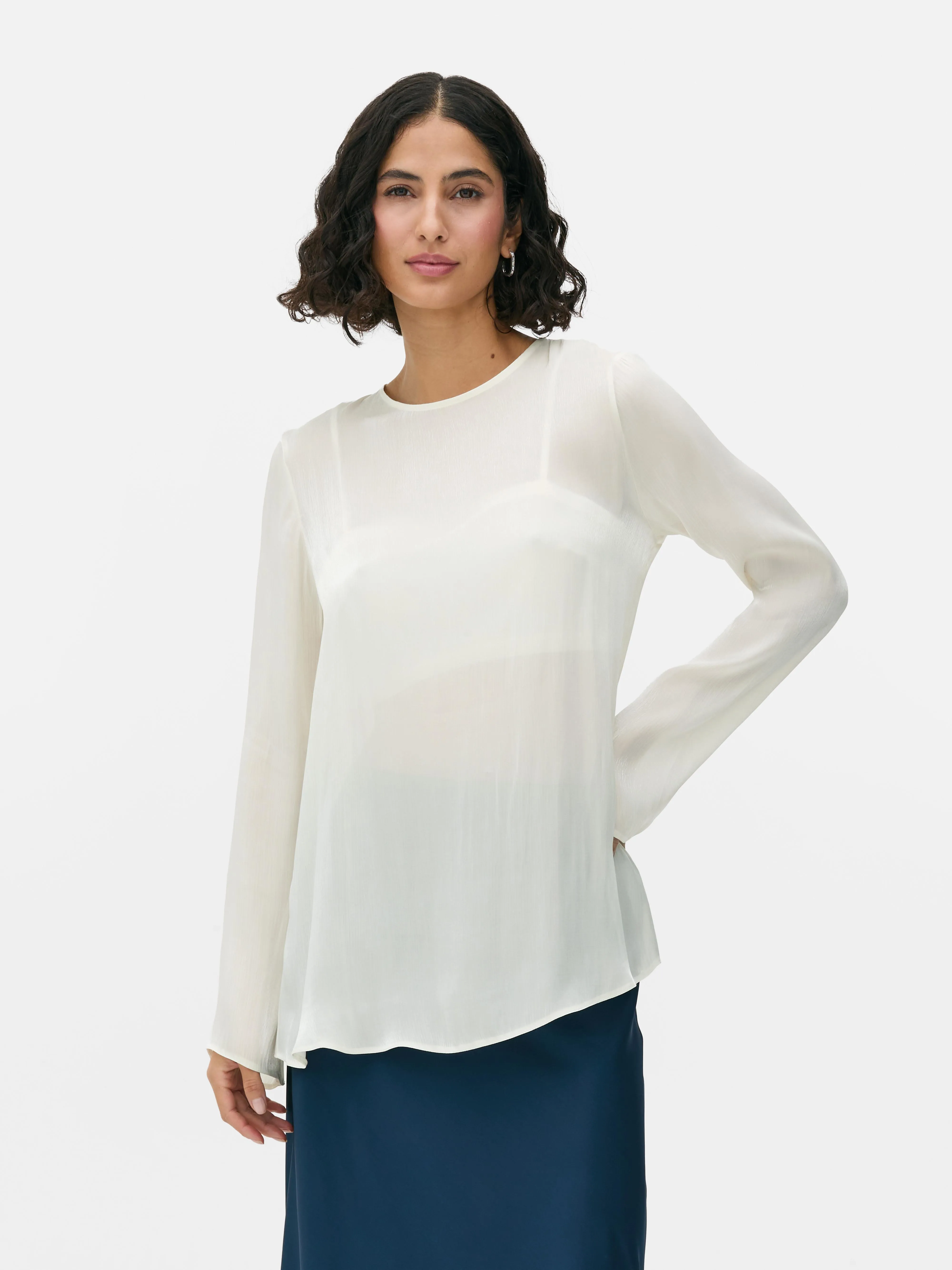 Blusa de manga larga brillante
