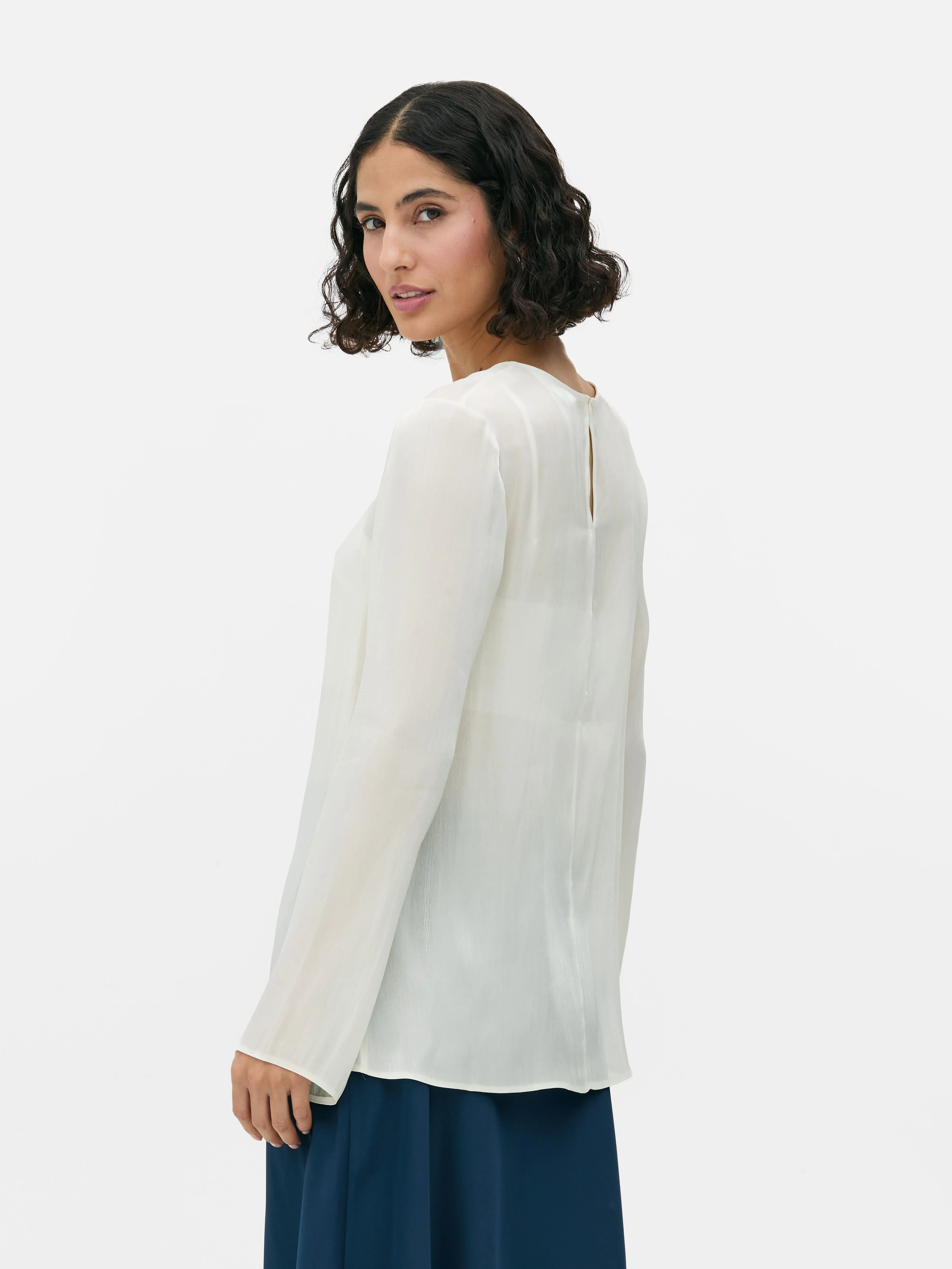 Blusa de manga larga brillante