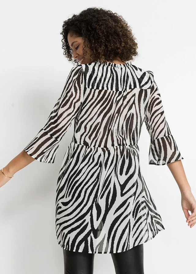 BLUSA LARGA NEGROBLANCO CON ESTAMPADO DE CEBRA