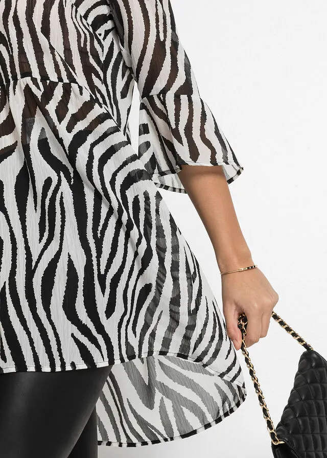 BLUSA LARGA NEGROBLANCO CON ESTAMPADO DE CEBRA
