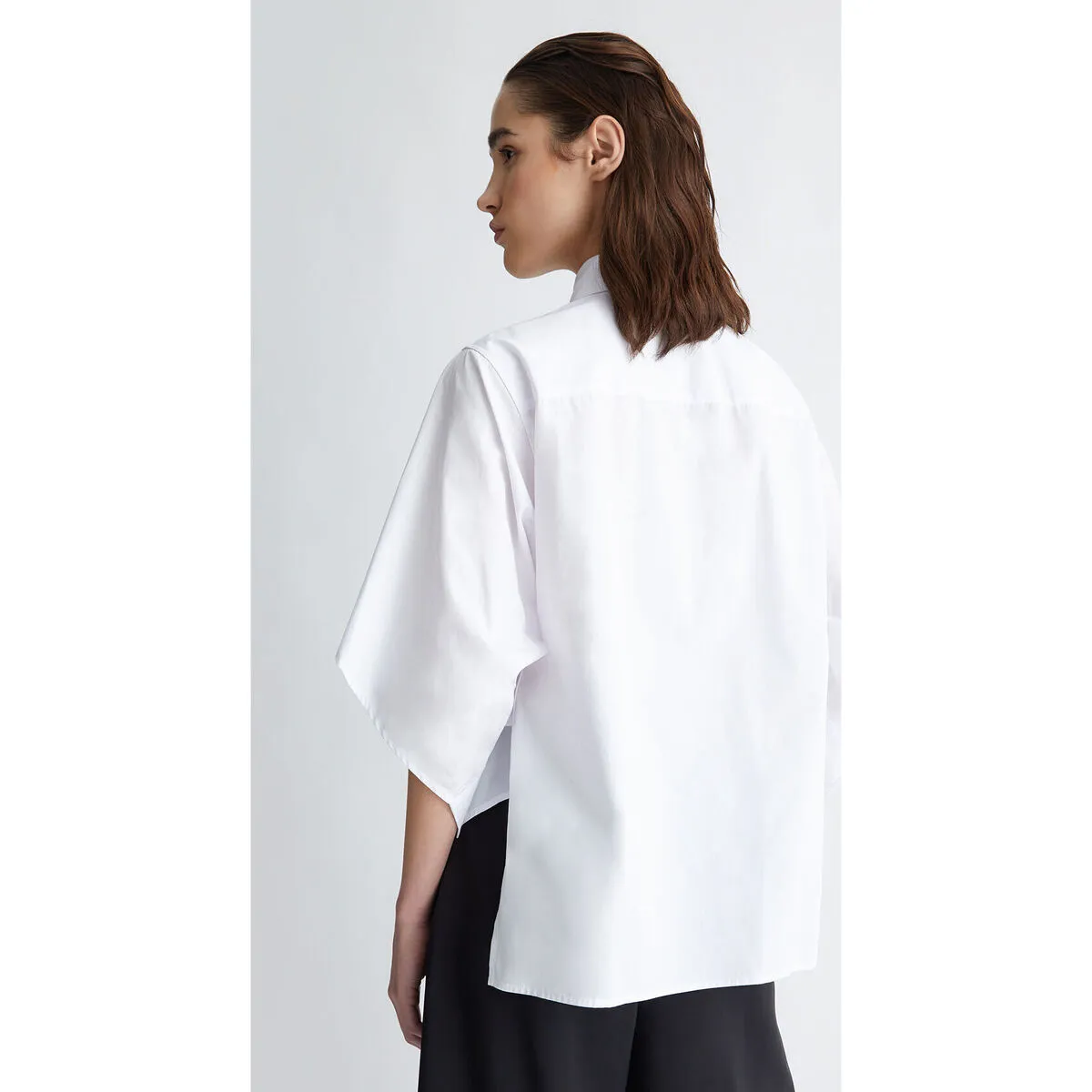 Camisa blanca holgada