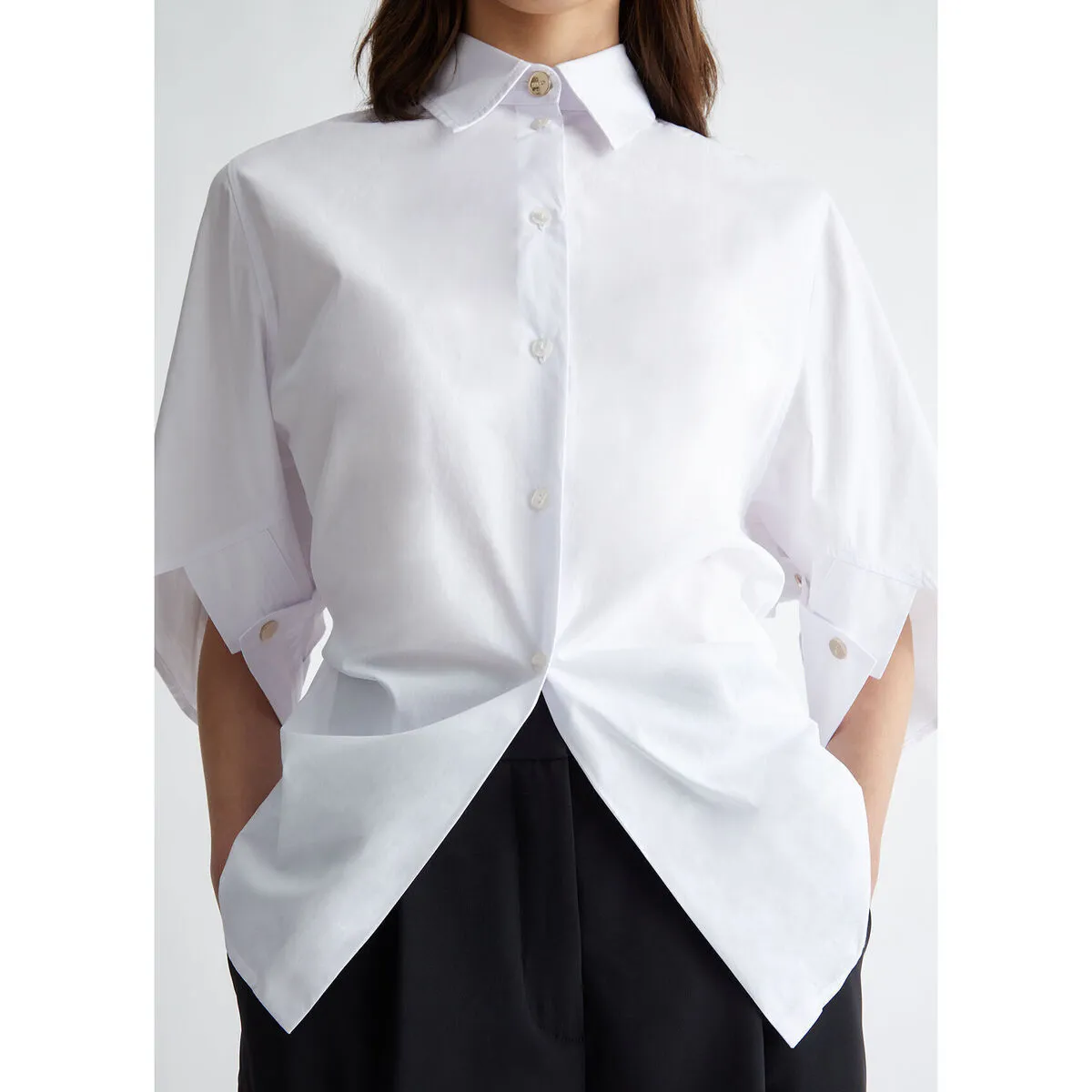 Camisa blanca holgada