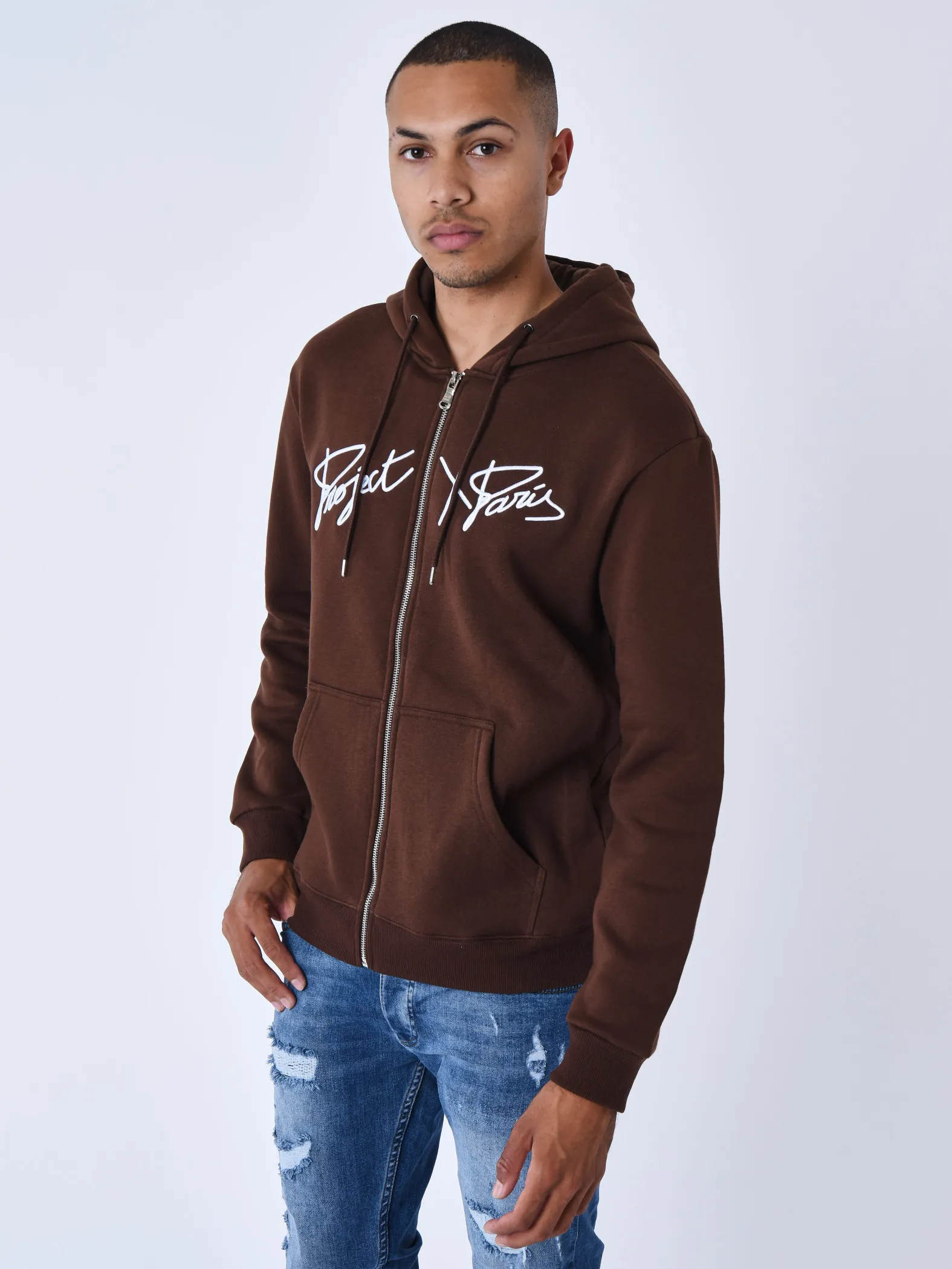 Chaqueta con cremallera y capucha Origin con bordado