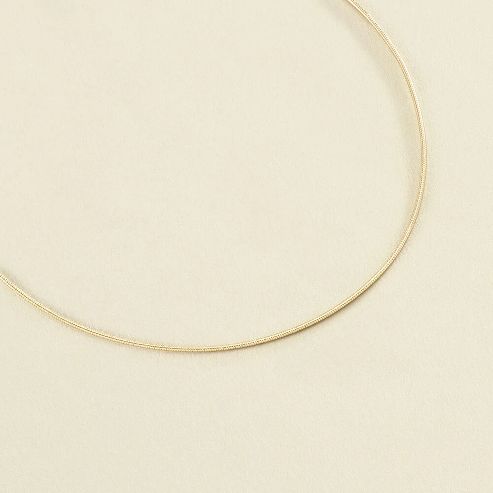COLLAR CORTO RíGIDA DORADO 02680215157