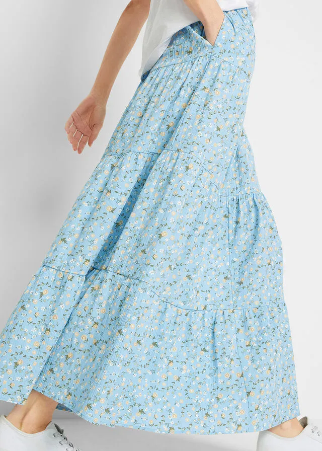 Falda larga con volantes azul claro con flores