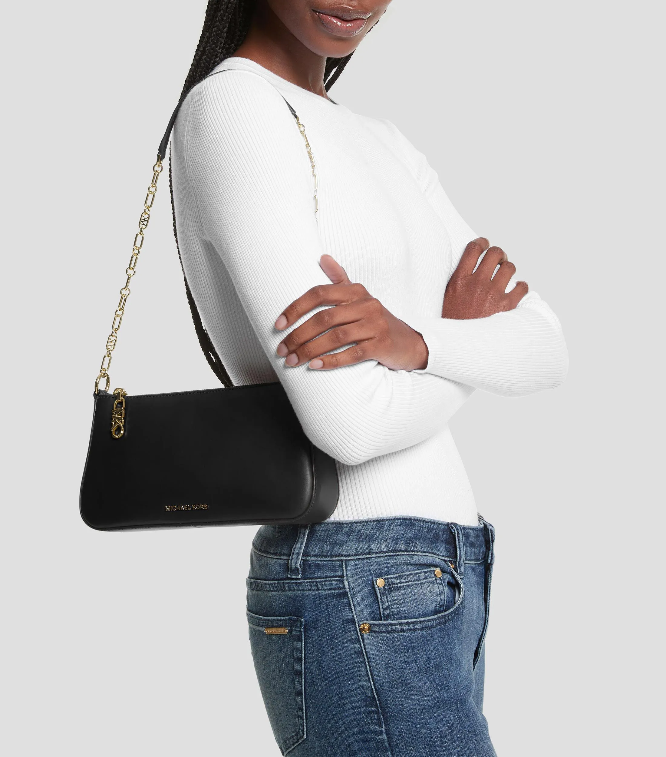 Michael Kors Bolso Pouch en piel liso Mujer