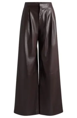 Pantalones de pinzas relaxed fit de piel sintética