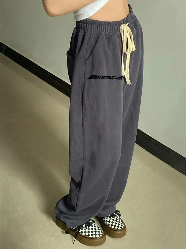 Pantalones deportivos con cordones y estampado de letras