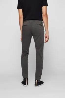 Pantalones tapered fit en satén de algodón elástico