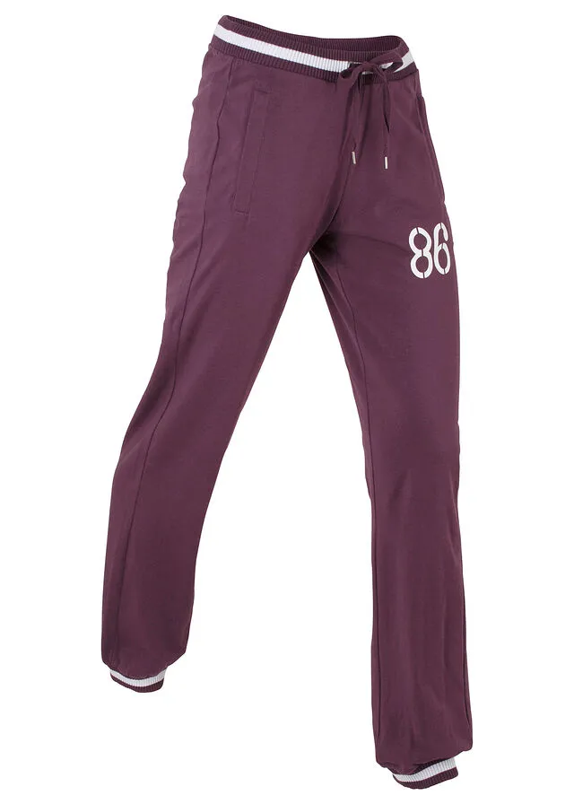 Pantalón deportivo con bolsillos con cierre morado intenso