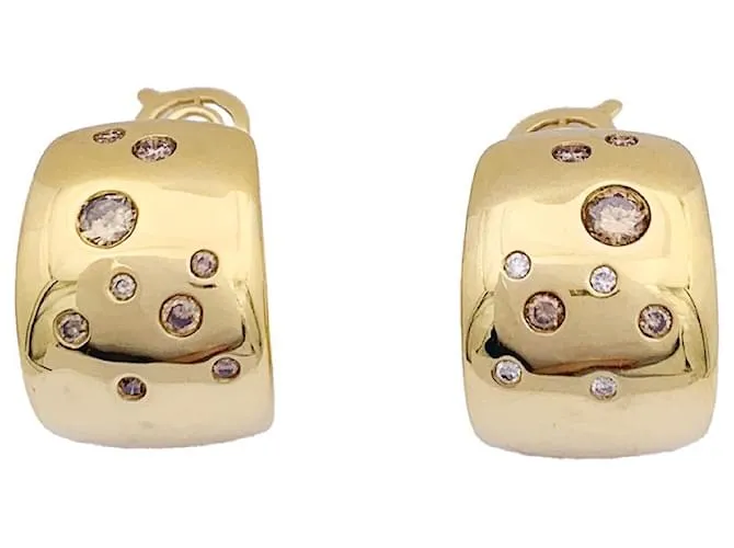 Pendientes Poiray, oro amarillo, diamantes marrones. 
