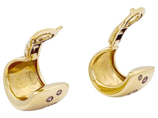 Pendientes Poiray, oro amarillo, diamantes marrones. 