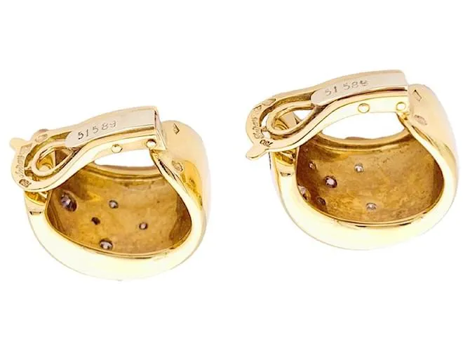 Pendientes Poiray, oro amarillo, diamantes marrones. 
