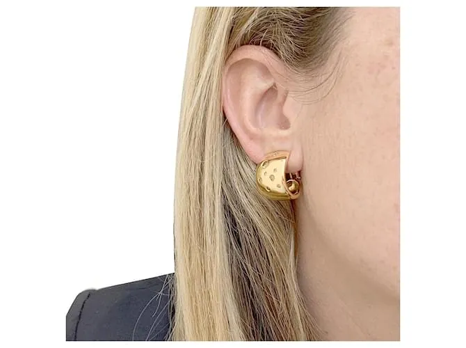 Pendientes Poiray, oro amarillo, diamantes marrones. 