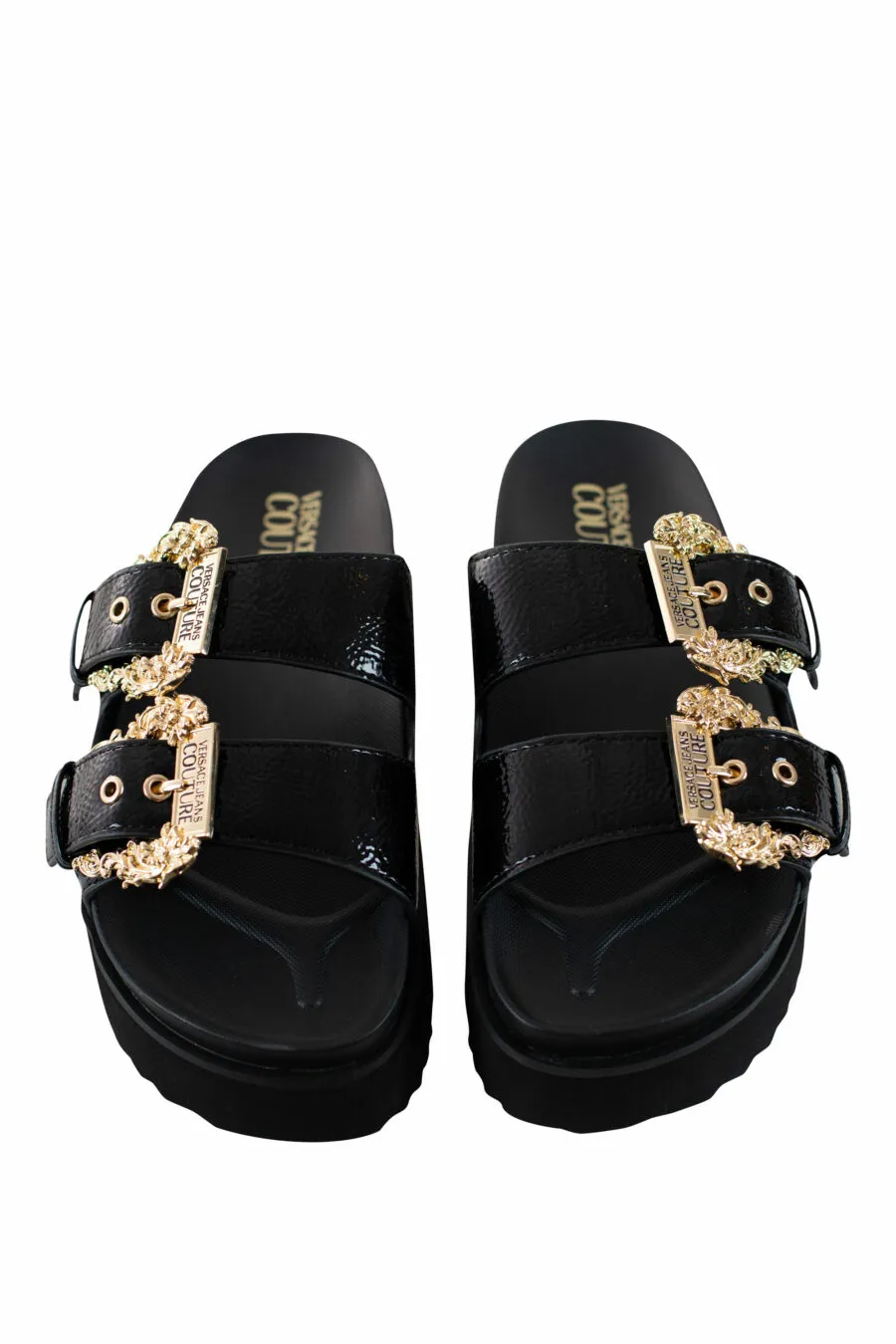 Sandalias negras con hebilla barroca