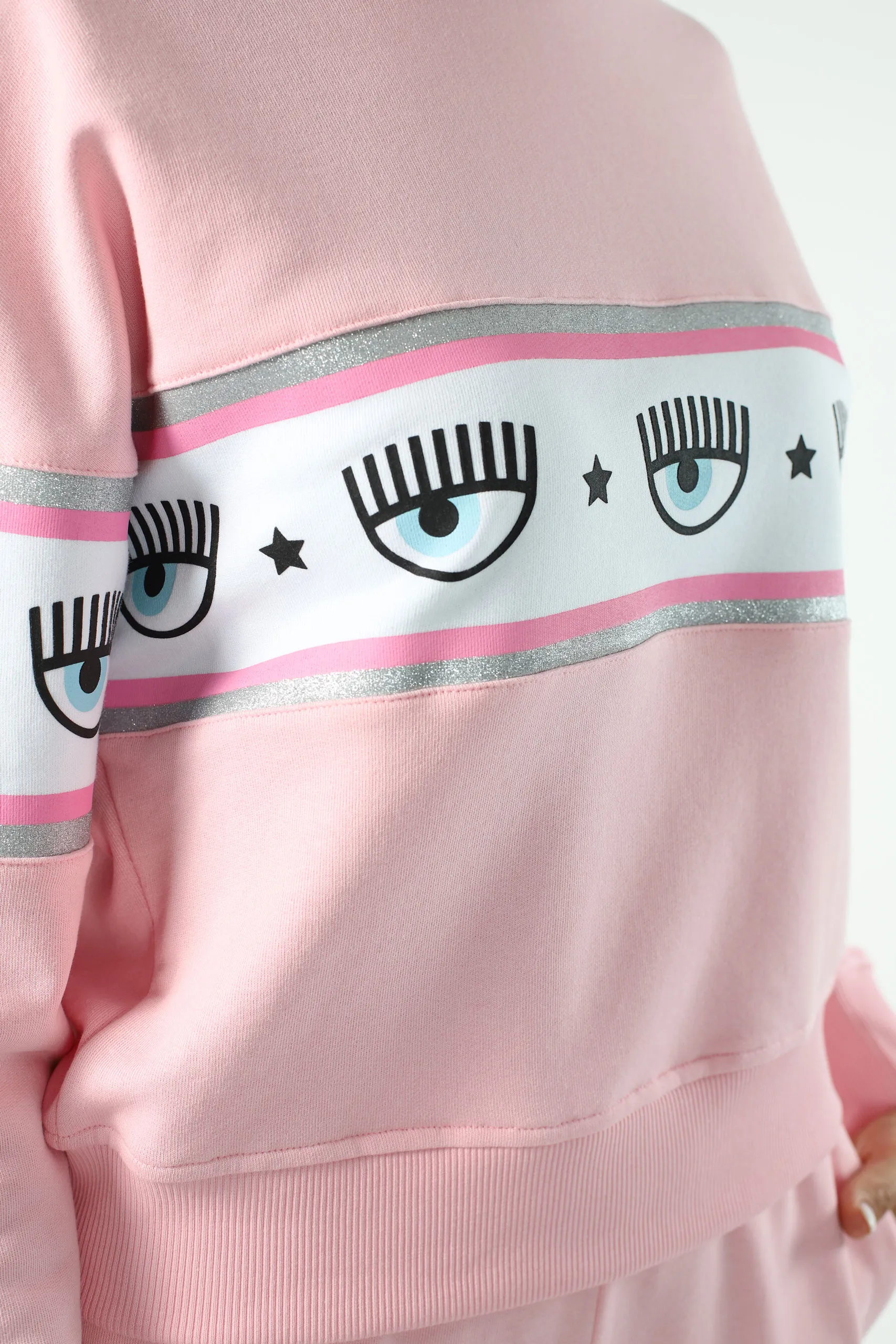 Sudadera rosa con logo ojo en cinta