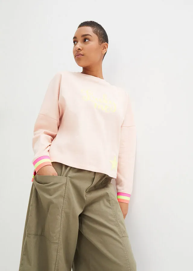 Sudadera rosa melocotón