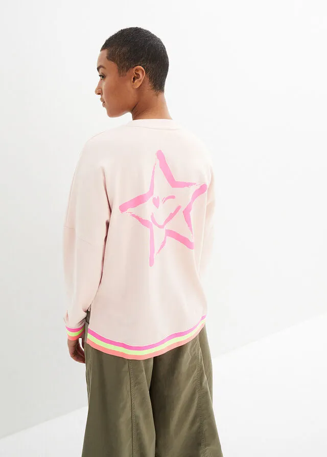 Sudadera rosa melocotón