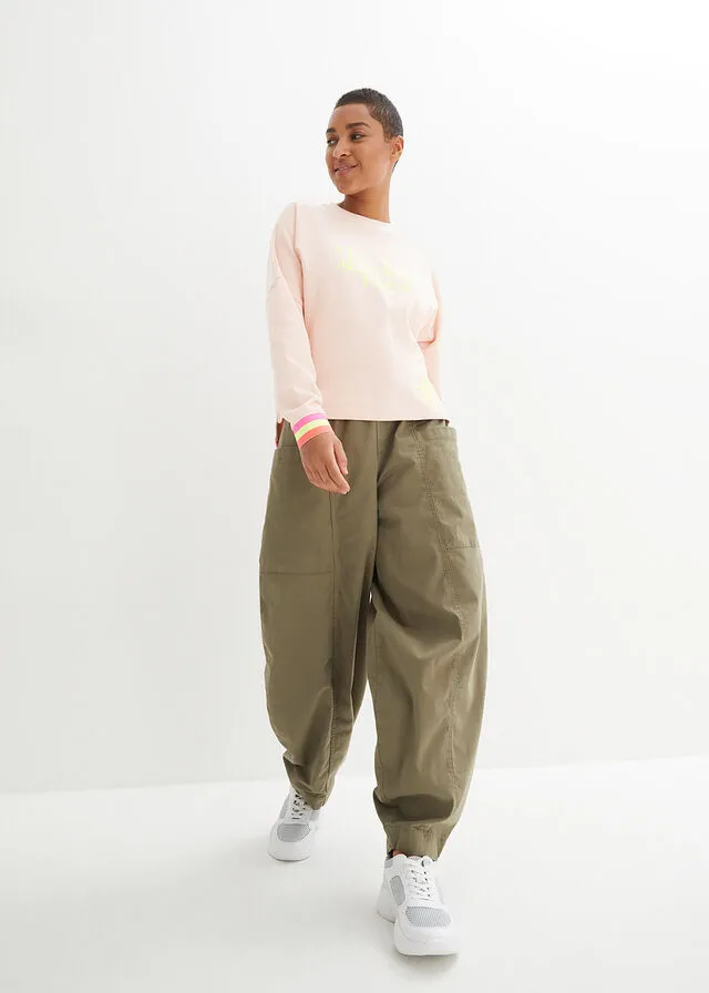 Sudadera rosa melocotón