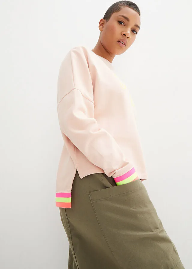 Sudadera rosa melocotón