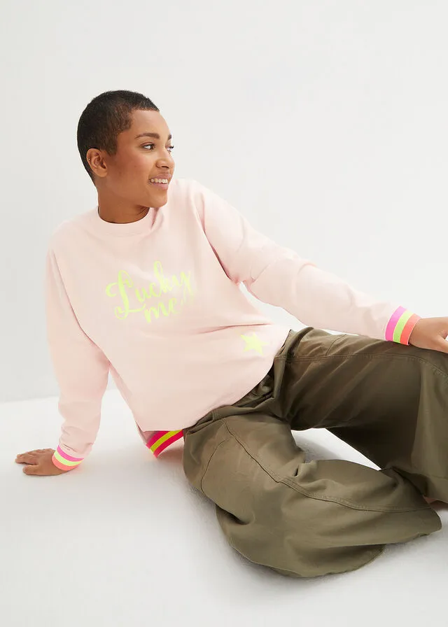 Sudadera rosa melocotón