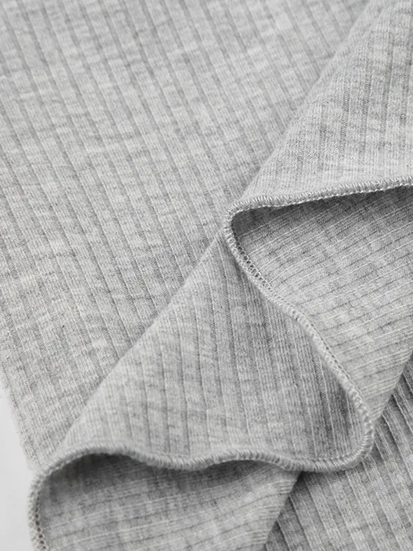 Tejido de punto de manga larga con correa de patchwork de encaje con cuello en V