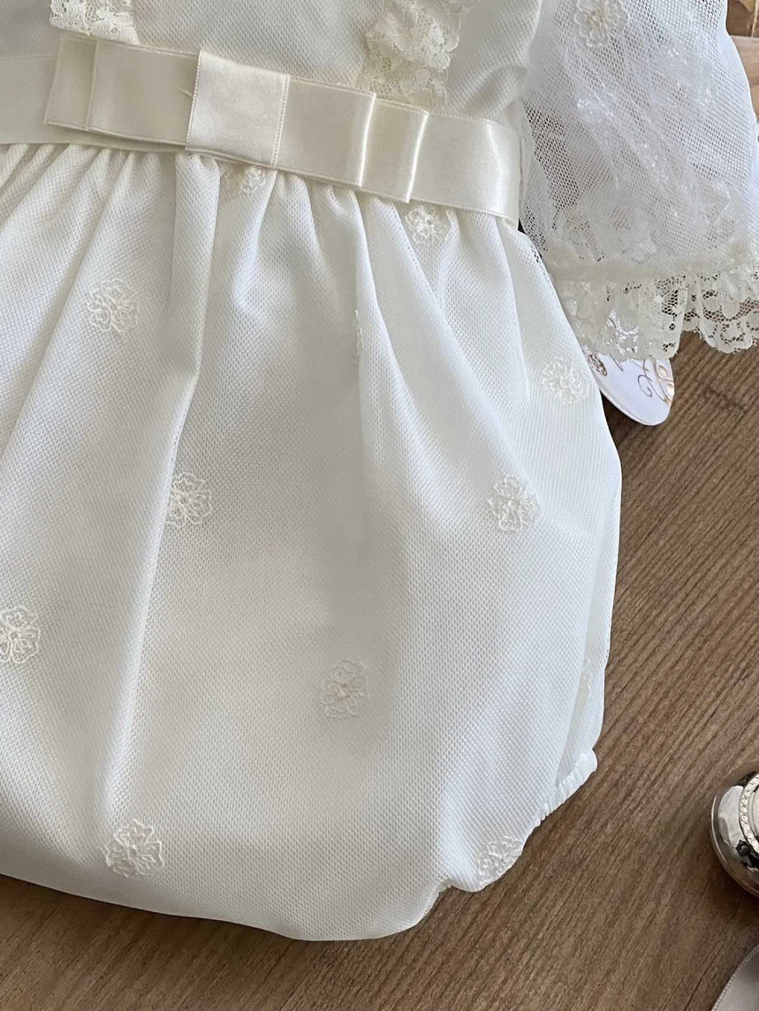 Unisex set. Embroidered tulle romper and bonnet