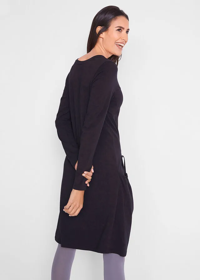 Vestido extragrande con bolsillos, con vuelo Negro