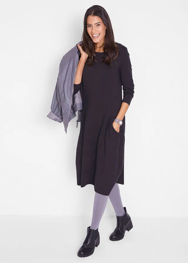Vestido extragrande con bolsillos, con vuelo Negro