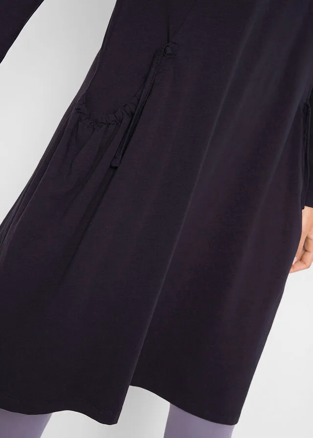 Vestido extragrande con bolsillos, con vuelo Negro